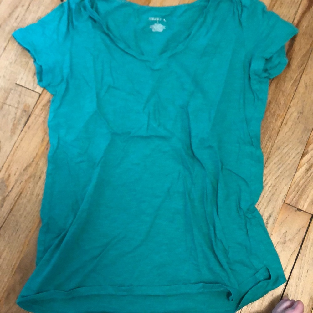 Green v-neck shirt